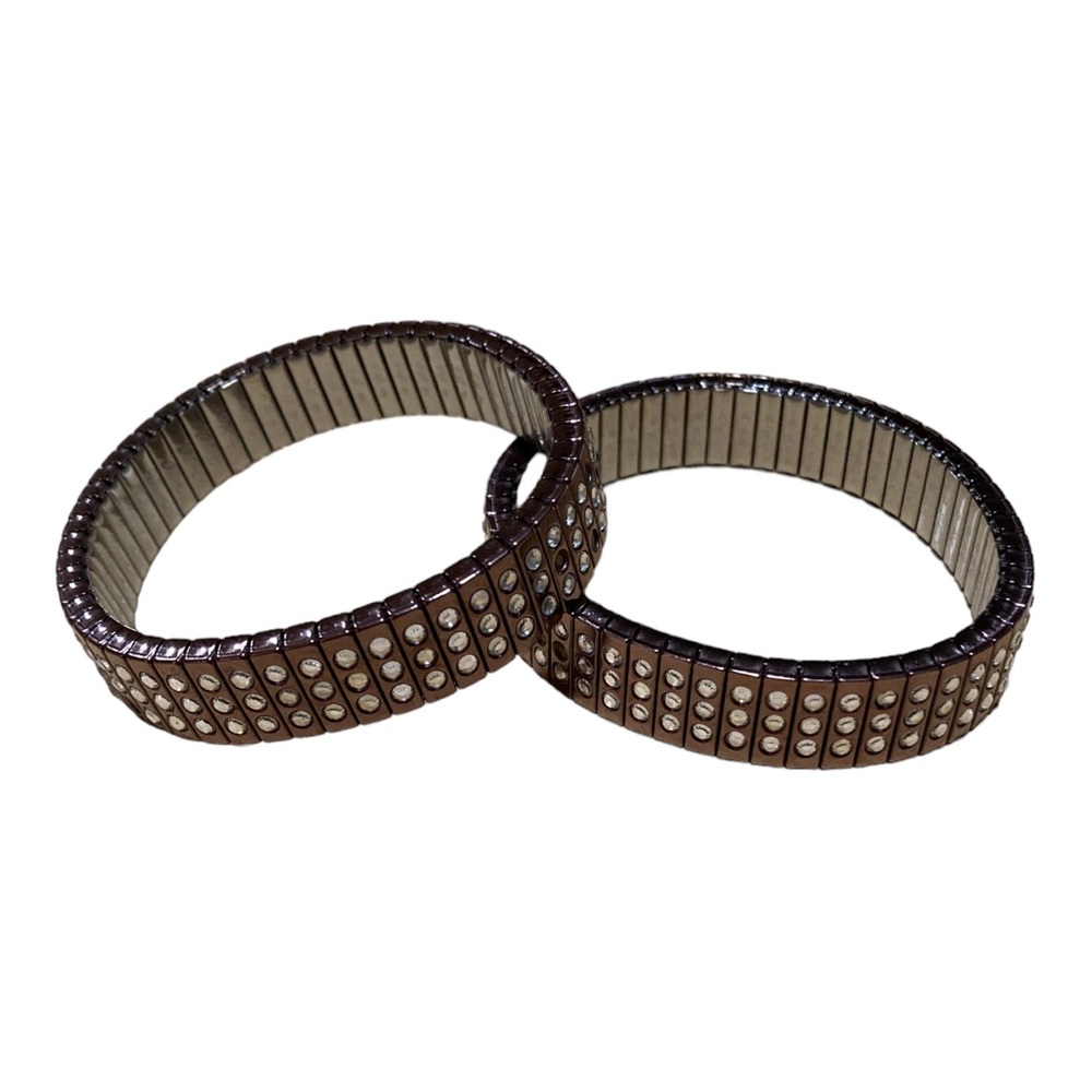 Rare signed Swarovski swan copper stretch bracelets.